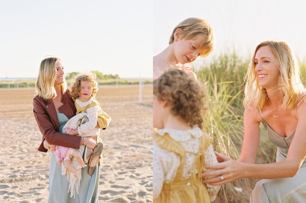 mom and kids play together on the beach for family pictures